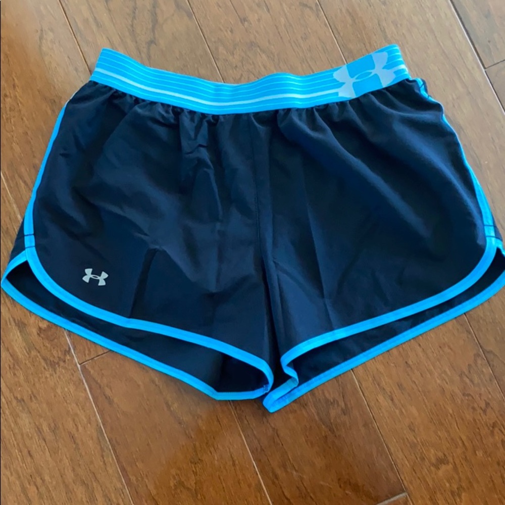 Under Armour workout shorts. Only worn once!